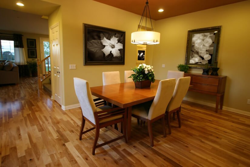 A Kent dining room with floors refinished by Fabulous Floors.