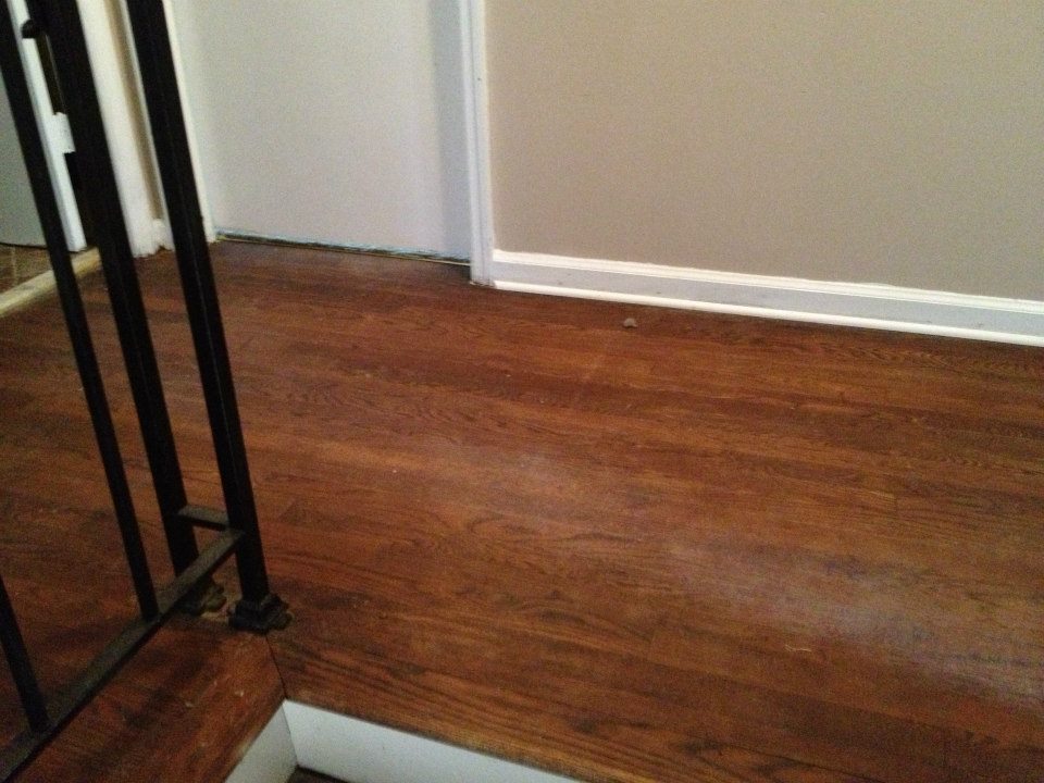 A hardwood floor in need of refinishing